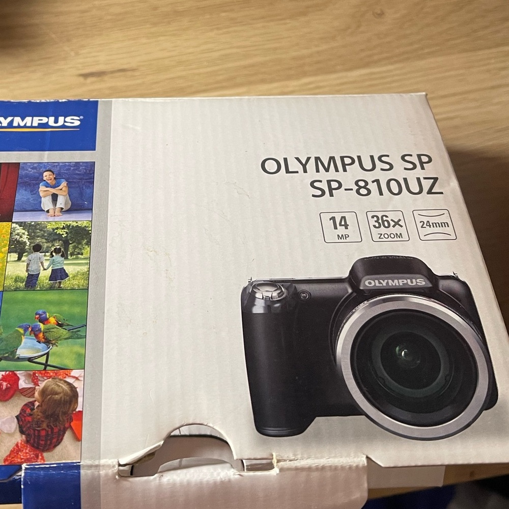 Olympus SP-810UZ Digital Camera 14 MP 36x Zoom